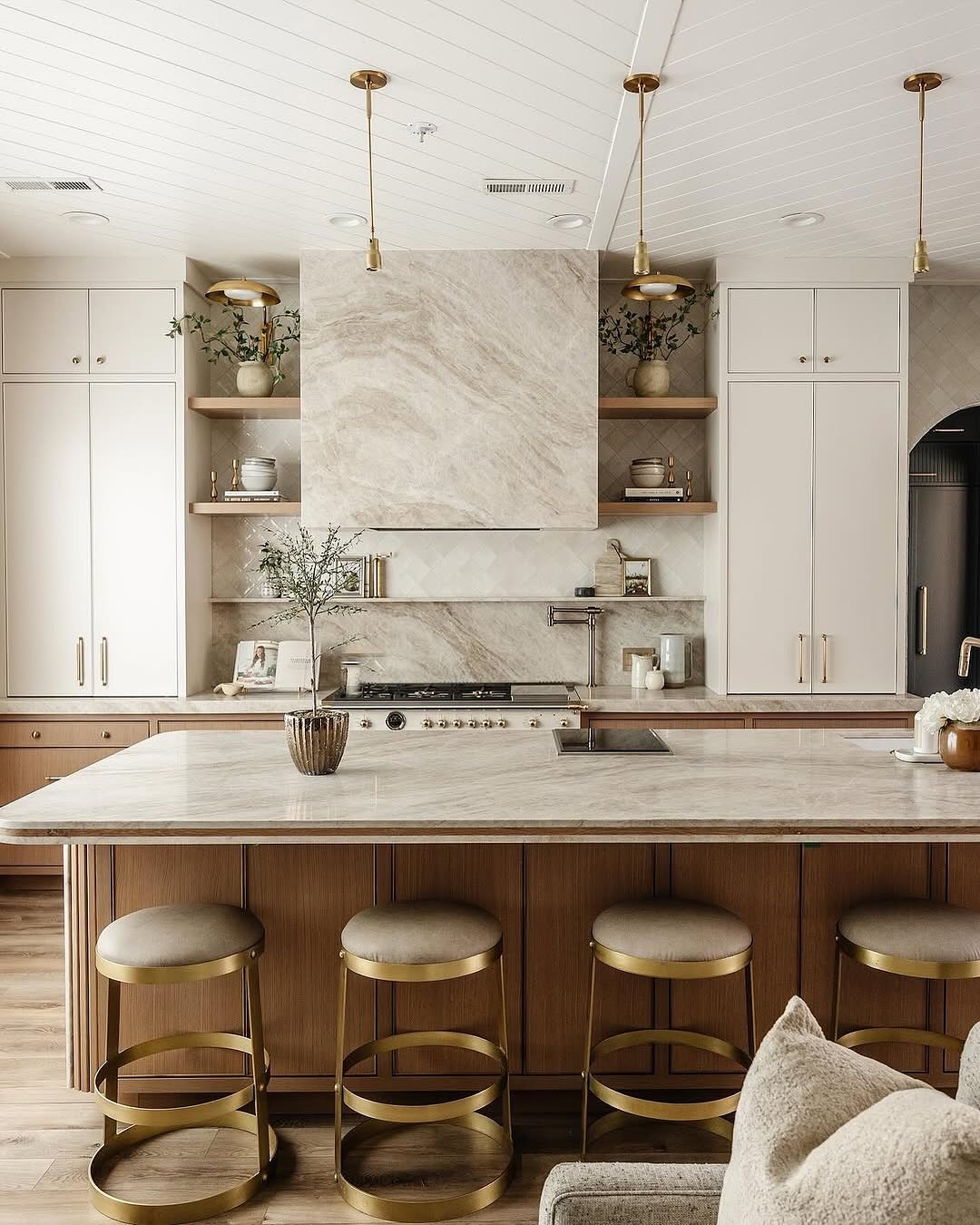 30. a Gleaming Marble Top with a Mosaic Of Mosaic Backsplash and Brass Accents