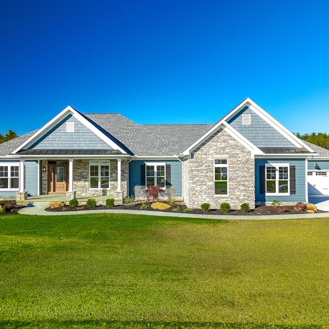 23. Ranch House with Sunlit White Columns and Crimson Shutter Accents