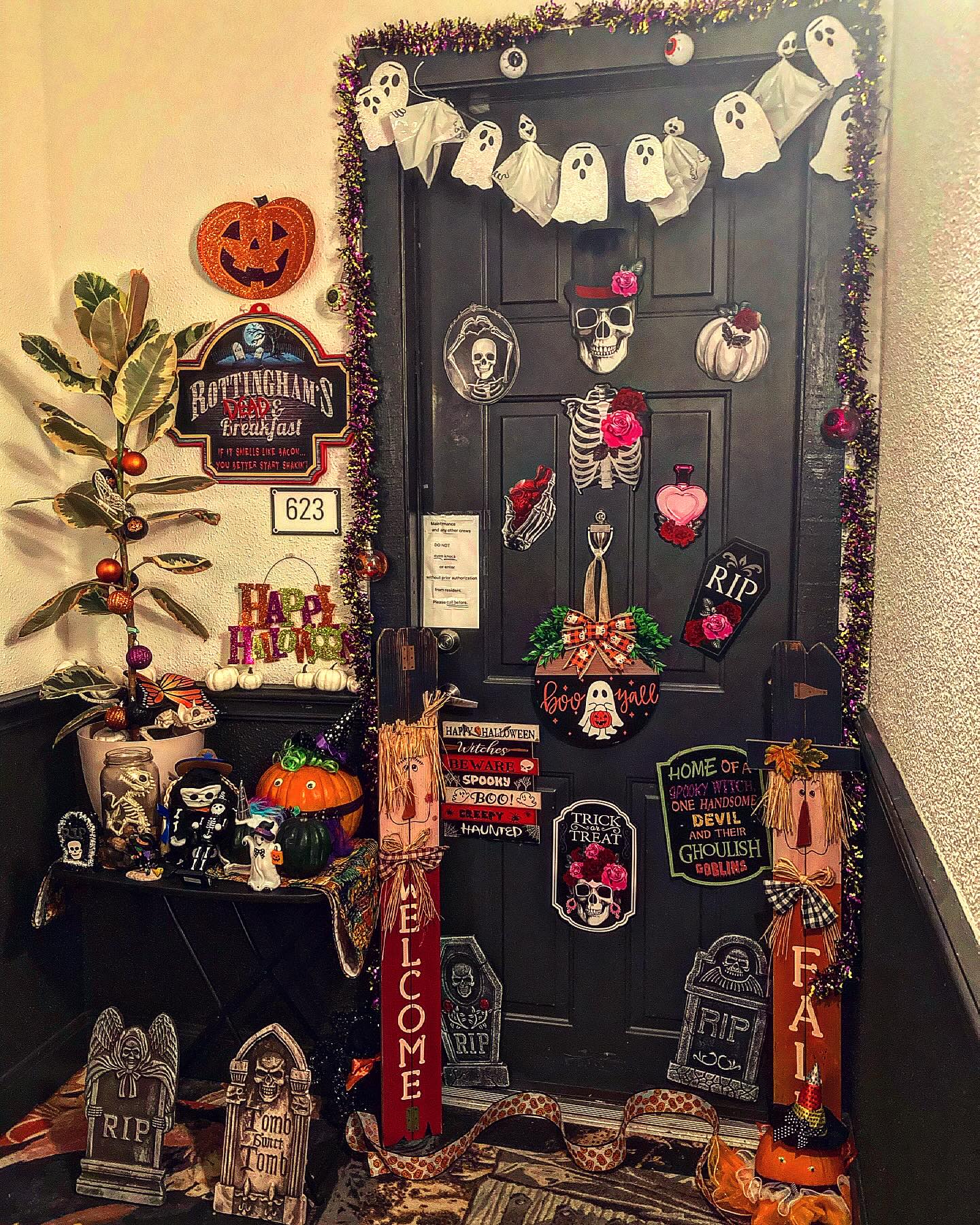 5. Spooky Silhouettes and Cobweb Canopy Over Vintage Lanterns