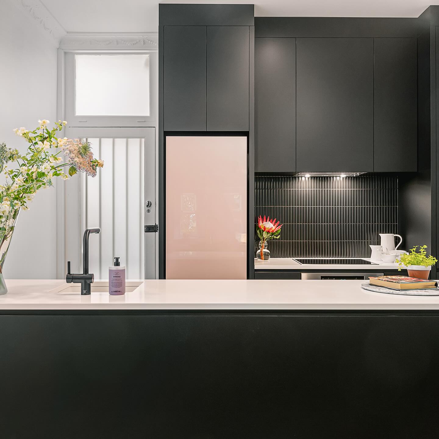 9. Geometric Symphony In Monochrome: the Triangular Backsplash Kitchen