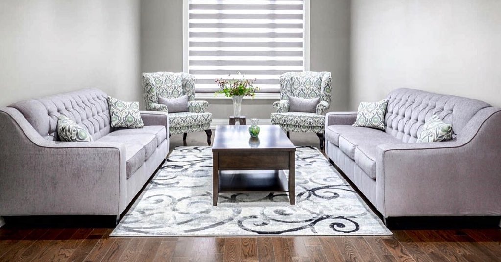 2. the Geometric Dance Of Rectangles: a Living Room with a Central Fireplace and Symmetrical Sofas
