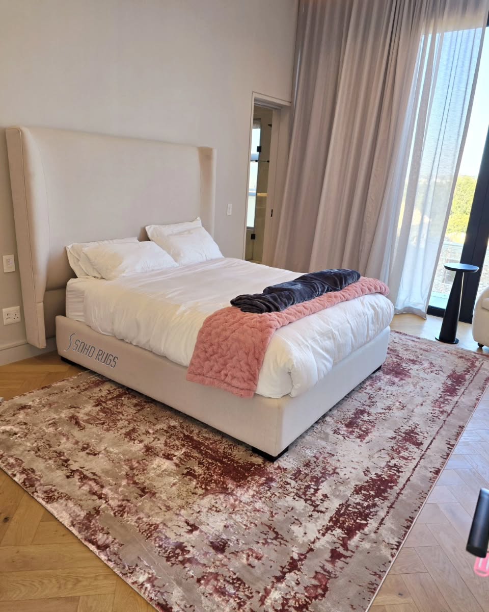 4. Crimson Threads on Cream: a Rug Of Subtle Elegance