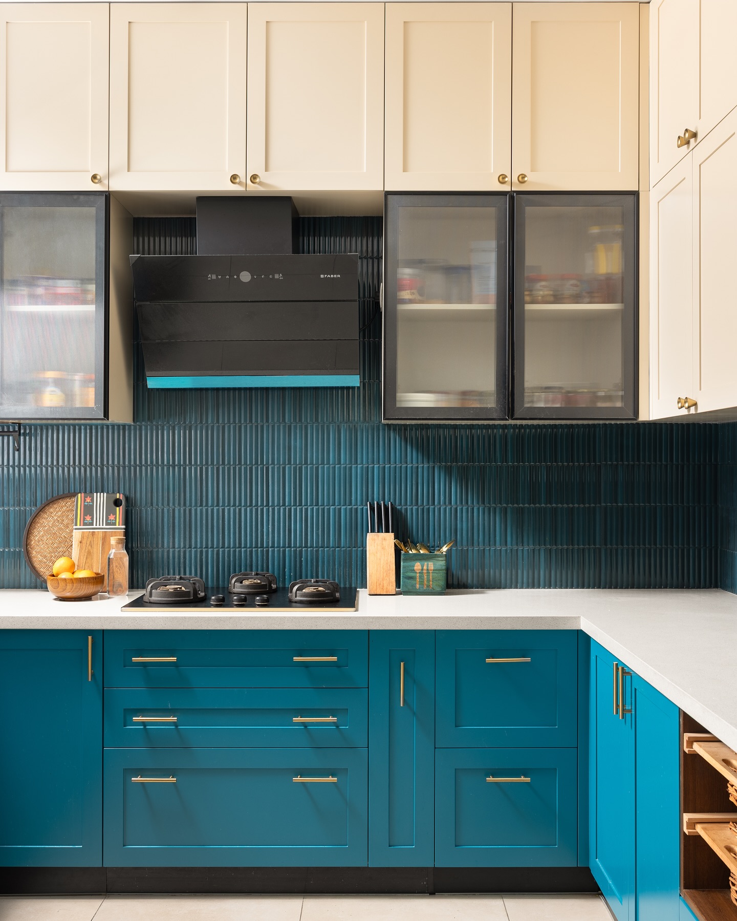 10. Indigo Indigo Vines and White Plates Cascade Over Kitchen Cabinets