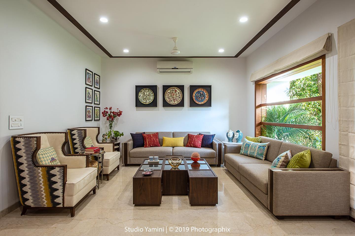 3. Sunlit Serenity: a Living Room with a Geometric Jute Rug and Verdant Green Accents