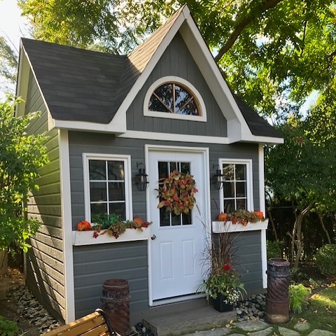 13. Sunlit Serenity: a Garden Path Of White Pebbles and Lush Greenery