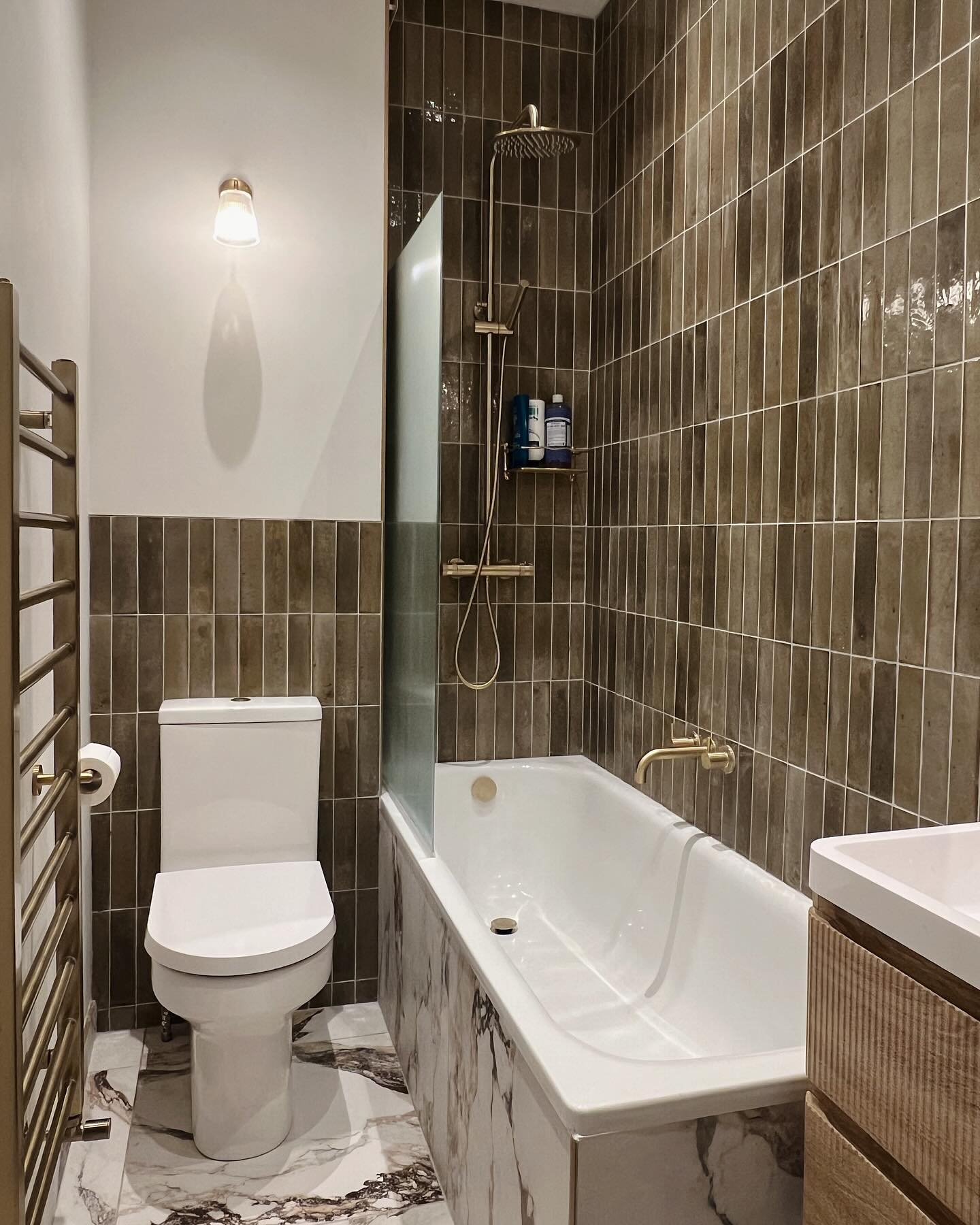 21. Tiny Copper Sink with Woven Basket Storage In a Compact Nook