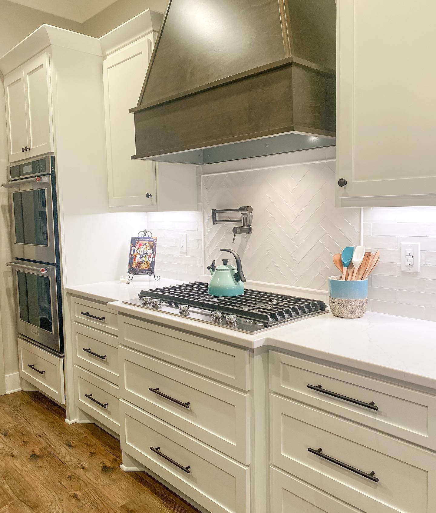 20. White Quartz Herringbone with Copper Accents and Vintage Charm