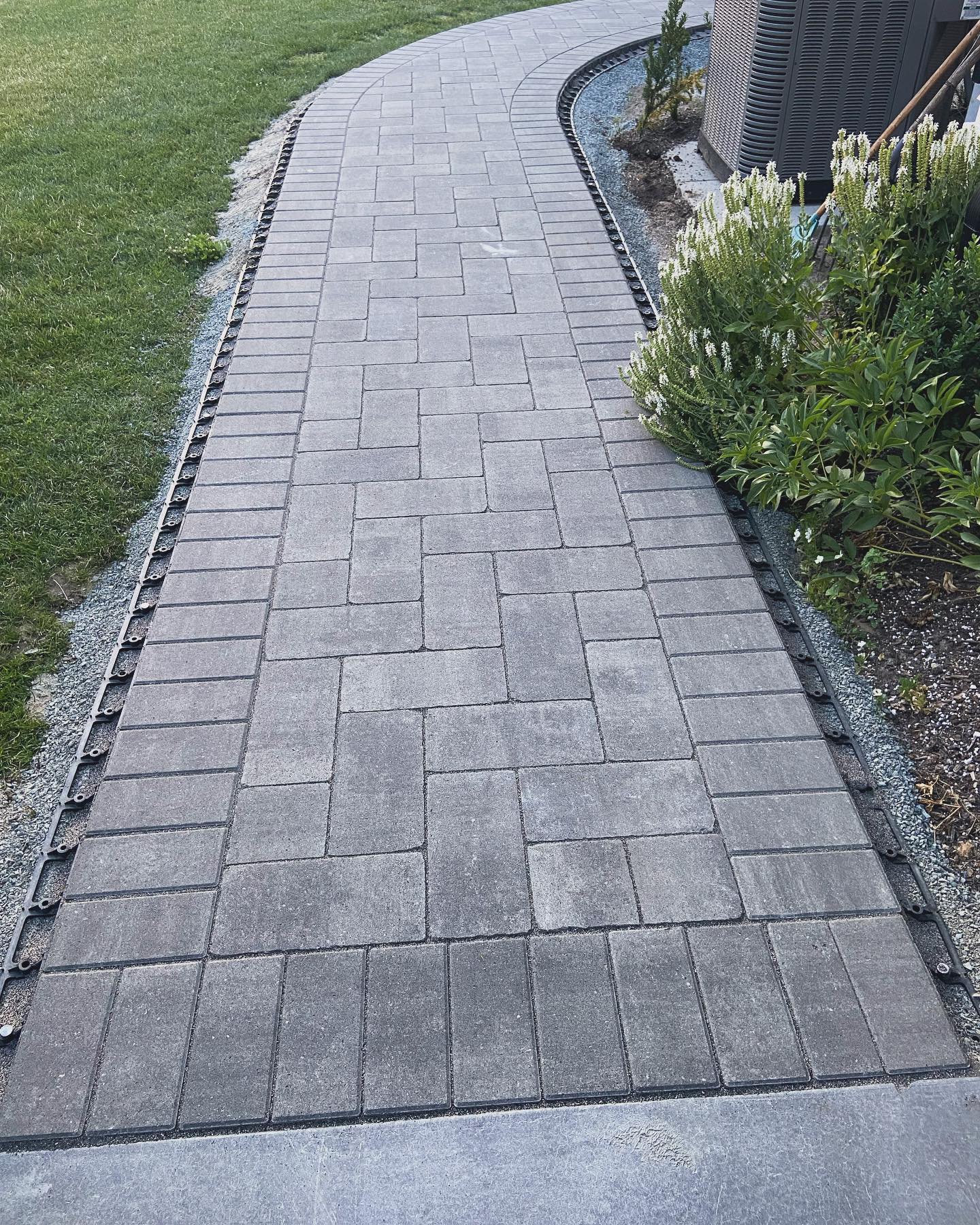 10. a Mosaic Of River Stones and Lanterns Guiding the Way