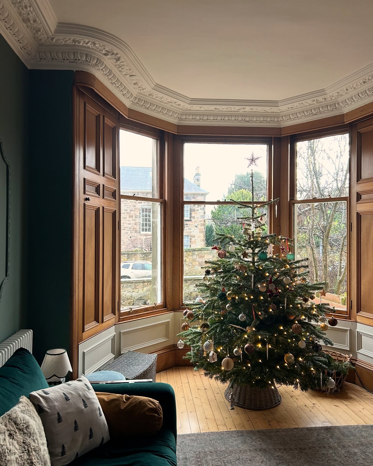 11. Velvet Drapes and Woven Baskets: a Cozy Nook by the Bay Window