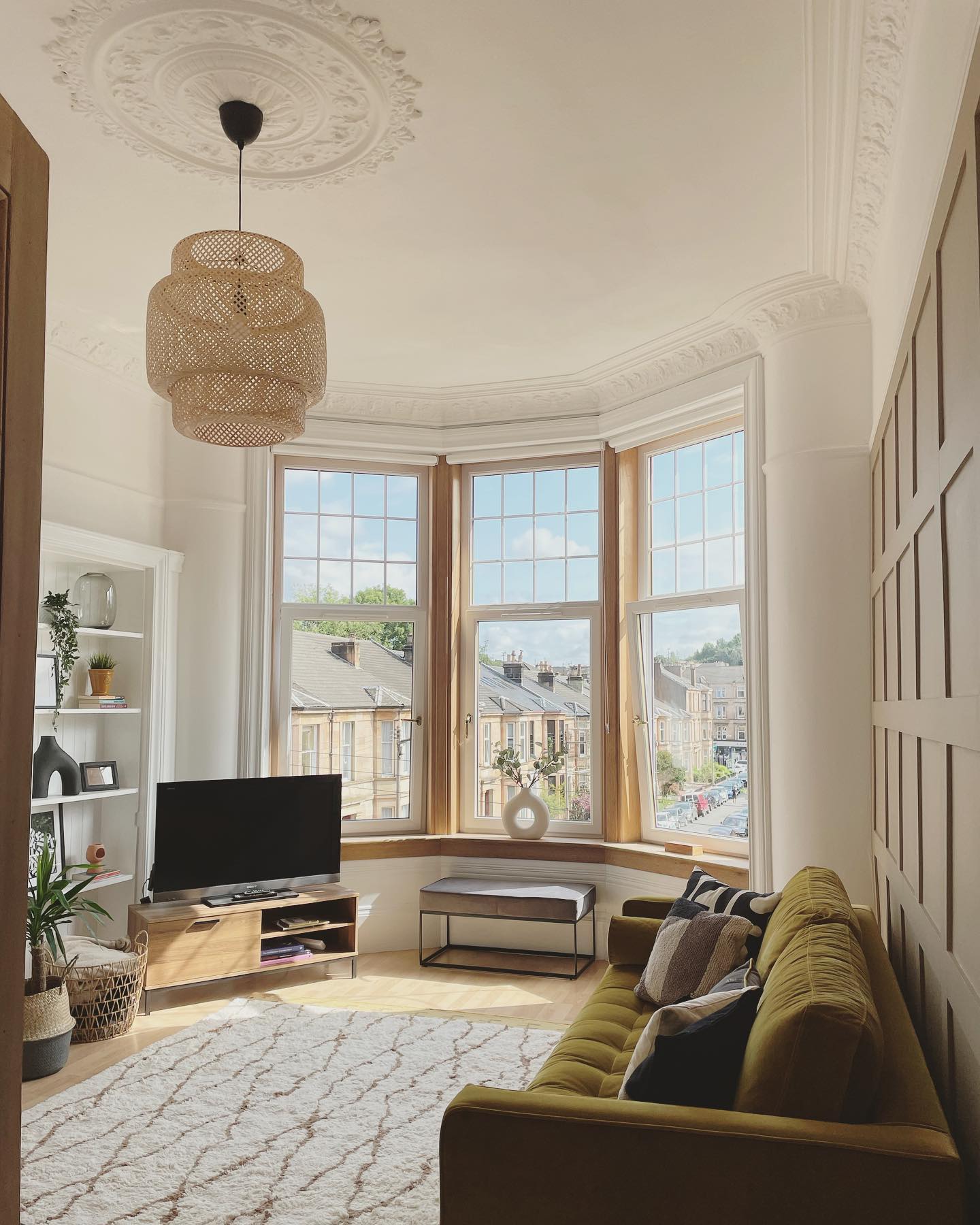 28. a Sunlit Sonata Of Terracotta Pots and Lush Greens on a Weathered Sill