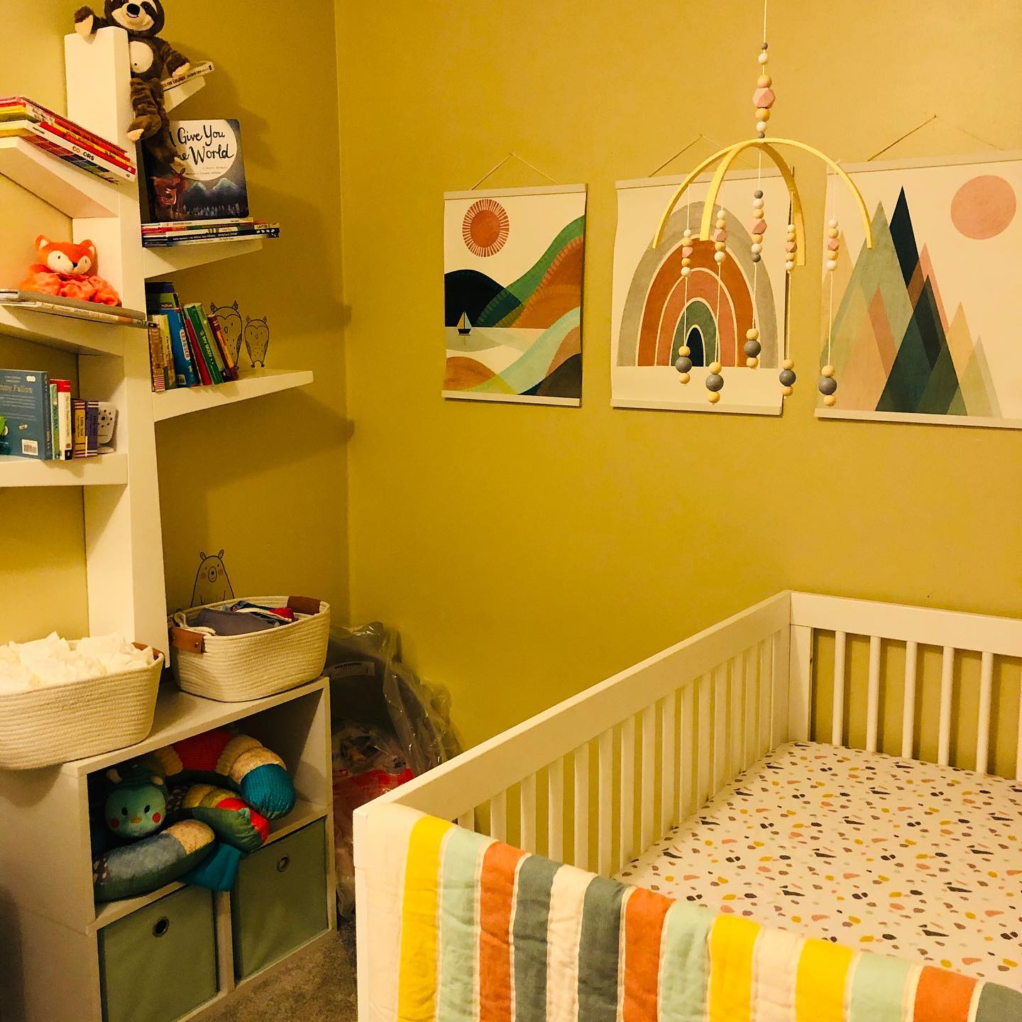 21. Neon Glow Crib Mobile and Starry Wall Decals In a Cozy Corner Nook