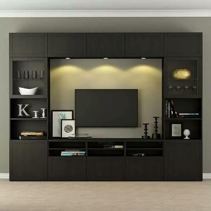 28. the Antique Clock and Succulent Shelf Ensemble Under the Television