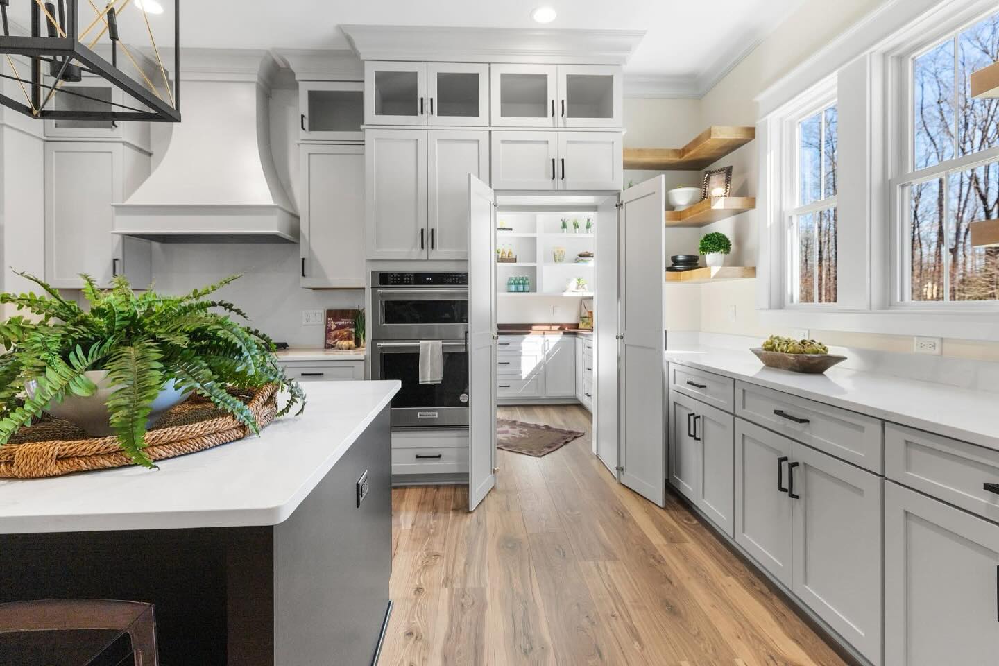 3. the Rustic Charm Of a Sliding Barn Door Concealing a Compact Pantry