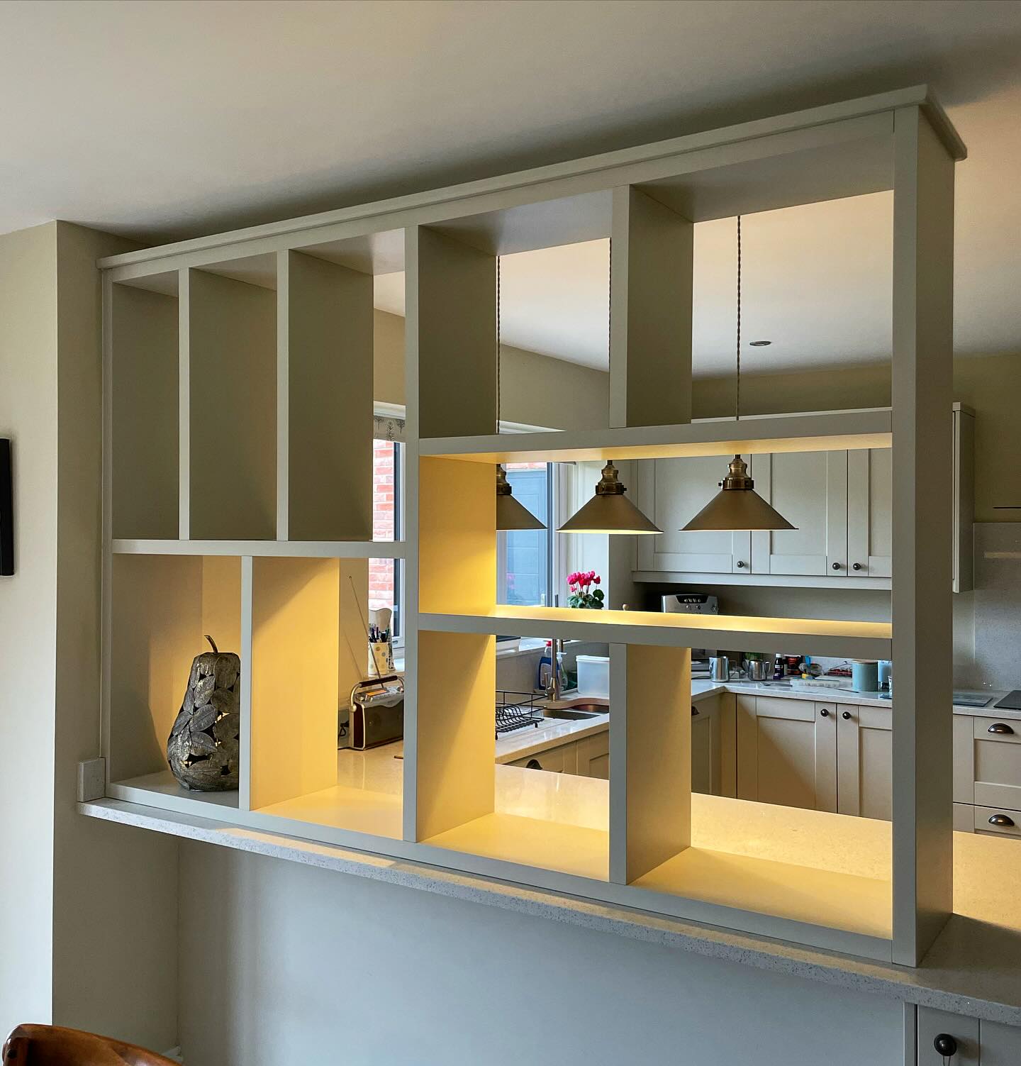 1. Sleek Black Framed Glass Panels with Geometric Grid Overlay