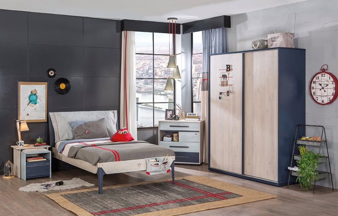 11. Cobalt Blue Accent Wall with Skateboard Shelves and Geometric Bedding