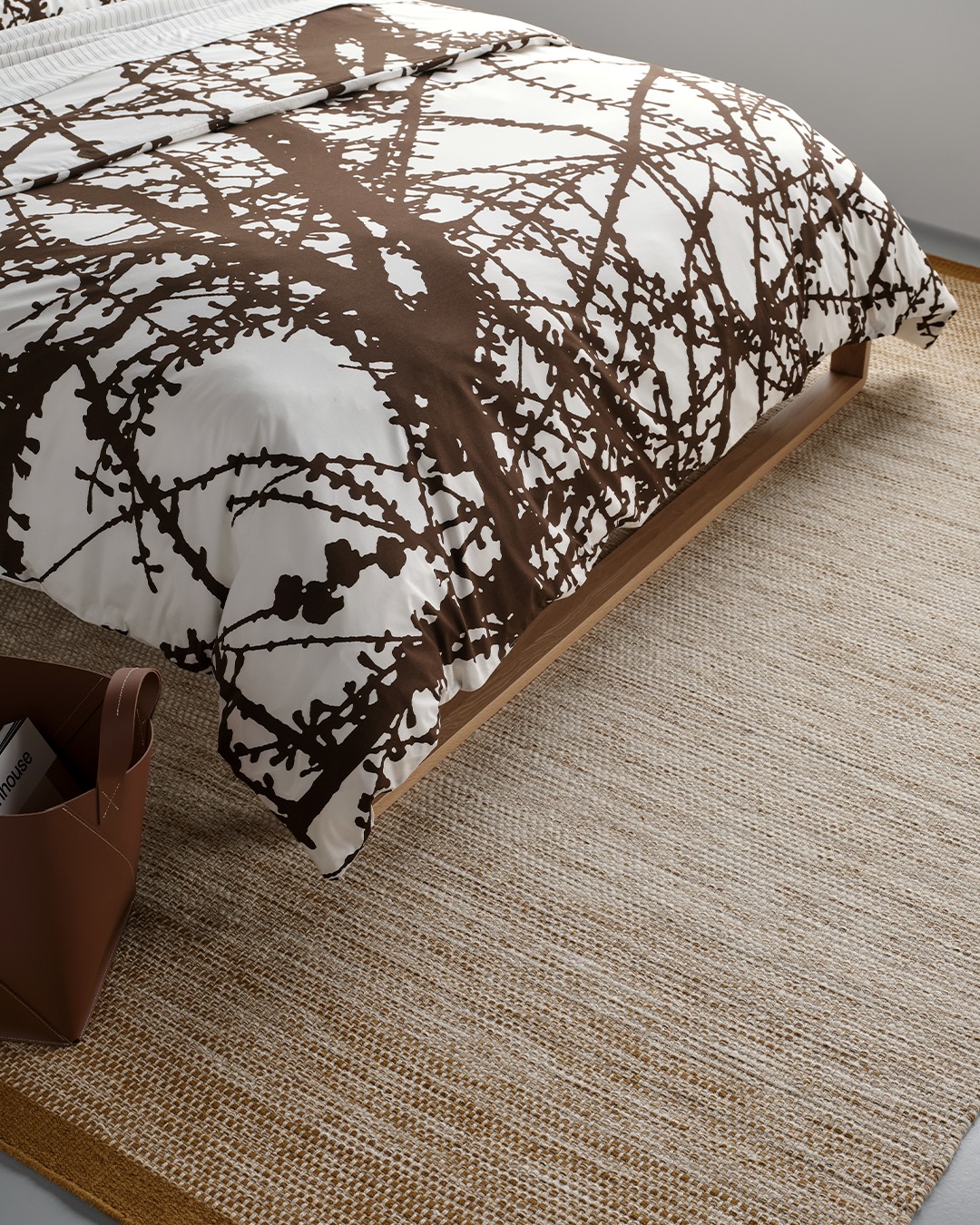 13. Crimson Waves on a Plush Canvas: the Unique Blend Of Red and Grey In a Bedroom Rug