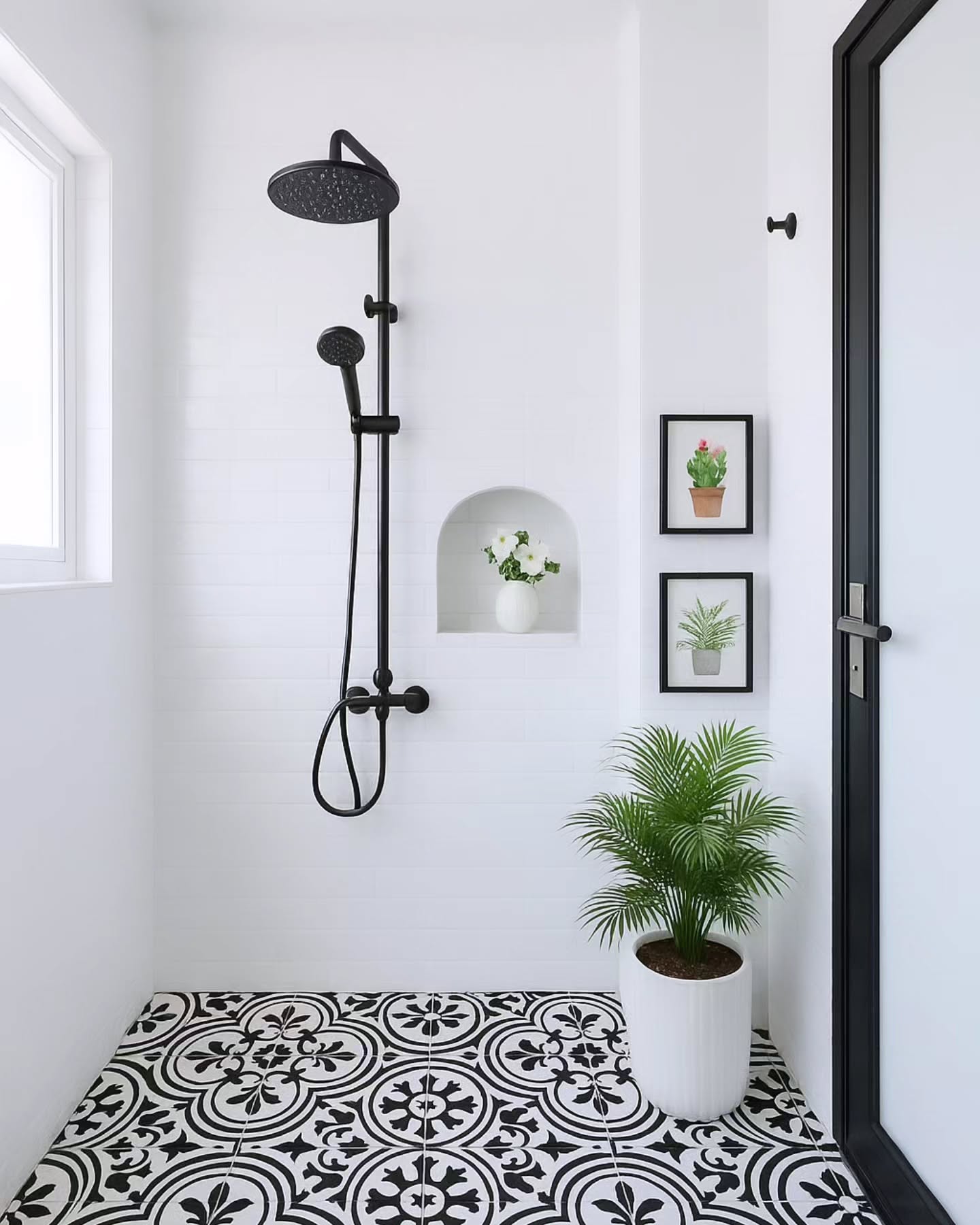 39. Moonlit Mosaic Tiles Reflecting Shadows In a Minimalist Monochrome Bathroom