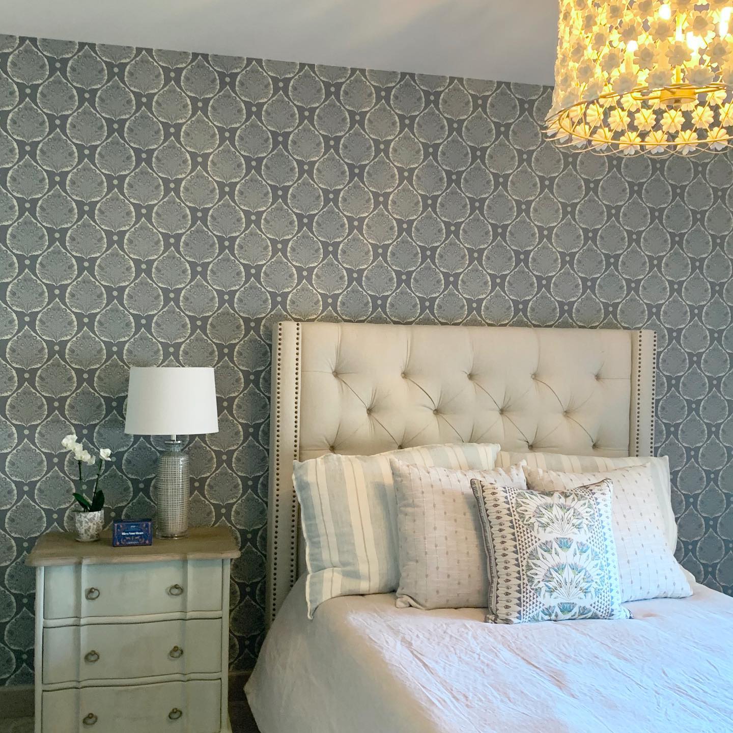 4. a Tapestry Of Time: Vintage Clock and Lush Greenery on a Cream Canvas