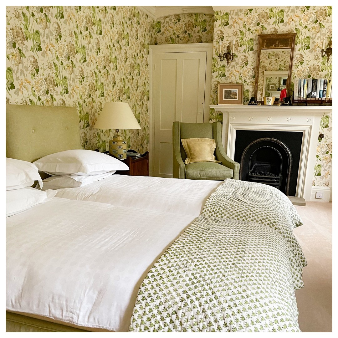 21. a Canopy Of Wildflowers and Woven Dreams Over a Brass Bed Frame