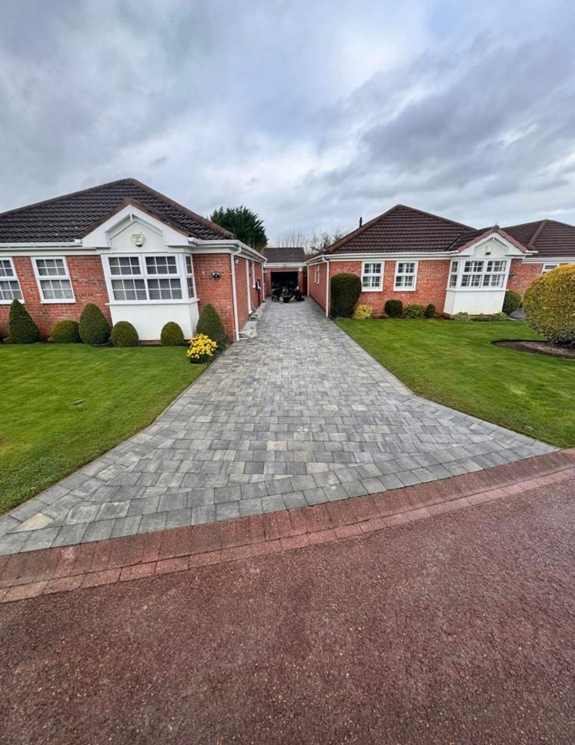6. the Asymmetrical Stone Pathway with Lavender and Boxwood Accents