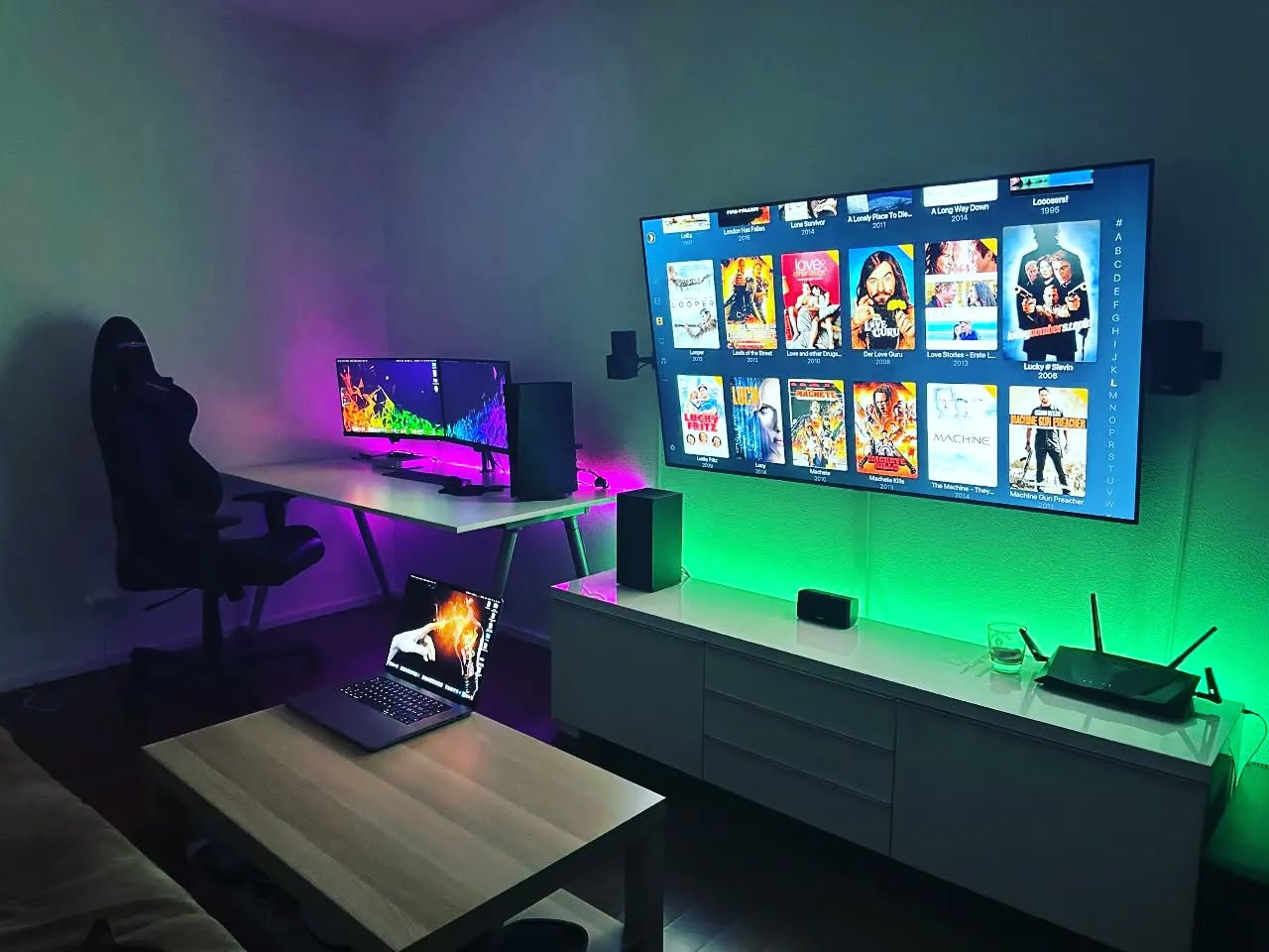 18. Neon Glow Gaming Nook with Suspended Pixelated Controller