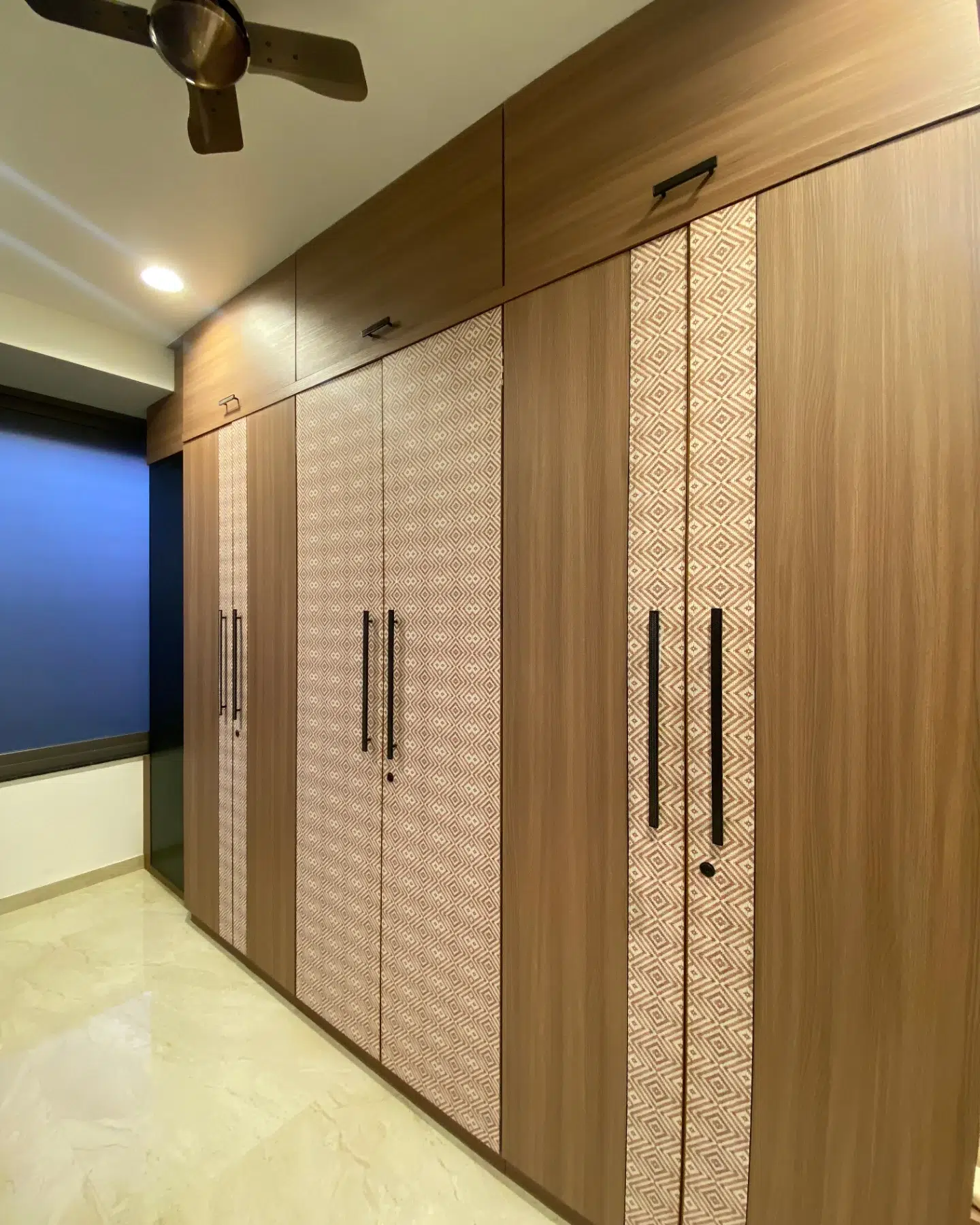 3. Moonlit Waves Of Wood: a Curved Wardrobe with Hidden Lighting